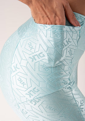 Legging fitness feminina verde logomania com recortes e bolsos flow