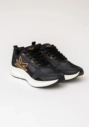 Tênis esportivo feminino preto com dourado dlk
